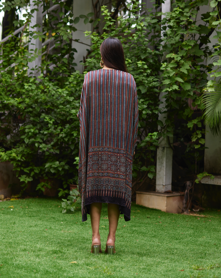 Black Striped Silk Kaftan at Kamakhyaa by Mayura Kumar. This item is Ajrakh Heritage, Black, Casual Wear, Dresses, Festive Wear, Kaftans, Mayura Kumar, Modal Silk, Prints, Relaxed Fit, Silk, Womenswear