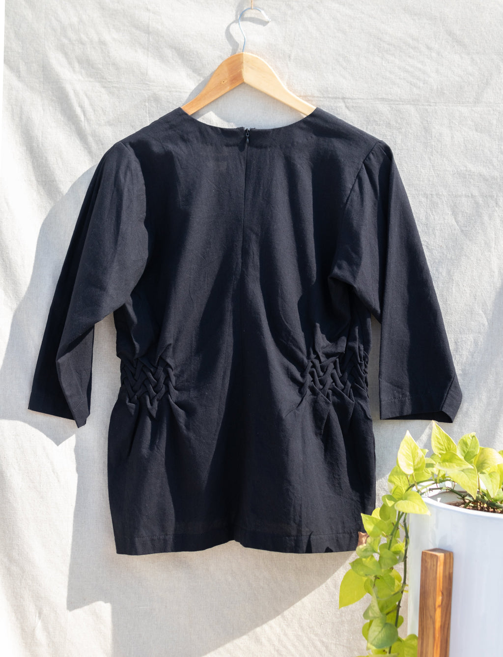 Black V-Neck Tunic Top at Kamakhyaa by Anushé Pirani. This item is Black, Blouses, Handwoven Cotton, July Sale, July Sale 2023, Natural, Office Wear, Regular Fit, sale anushe pirani, Solids, The Line Tales, Tops, Womenswear