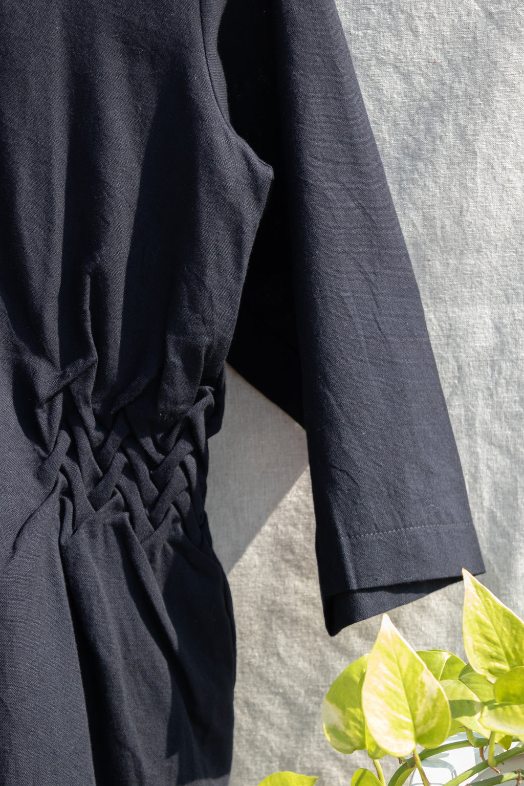 Black V-Neck Tunic Top at Kamakhyaa by Anushé Pirani. This item is Black, Blouses, Handwoven Cotton, July Sale, July Sale 2023, Natural, Office Wear, Regular Fit, sale anushe pirani, Solids, The Line Tales, Tops, Womenswear