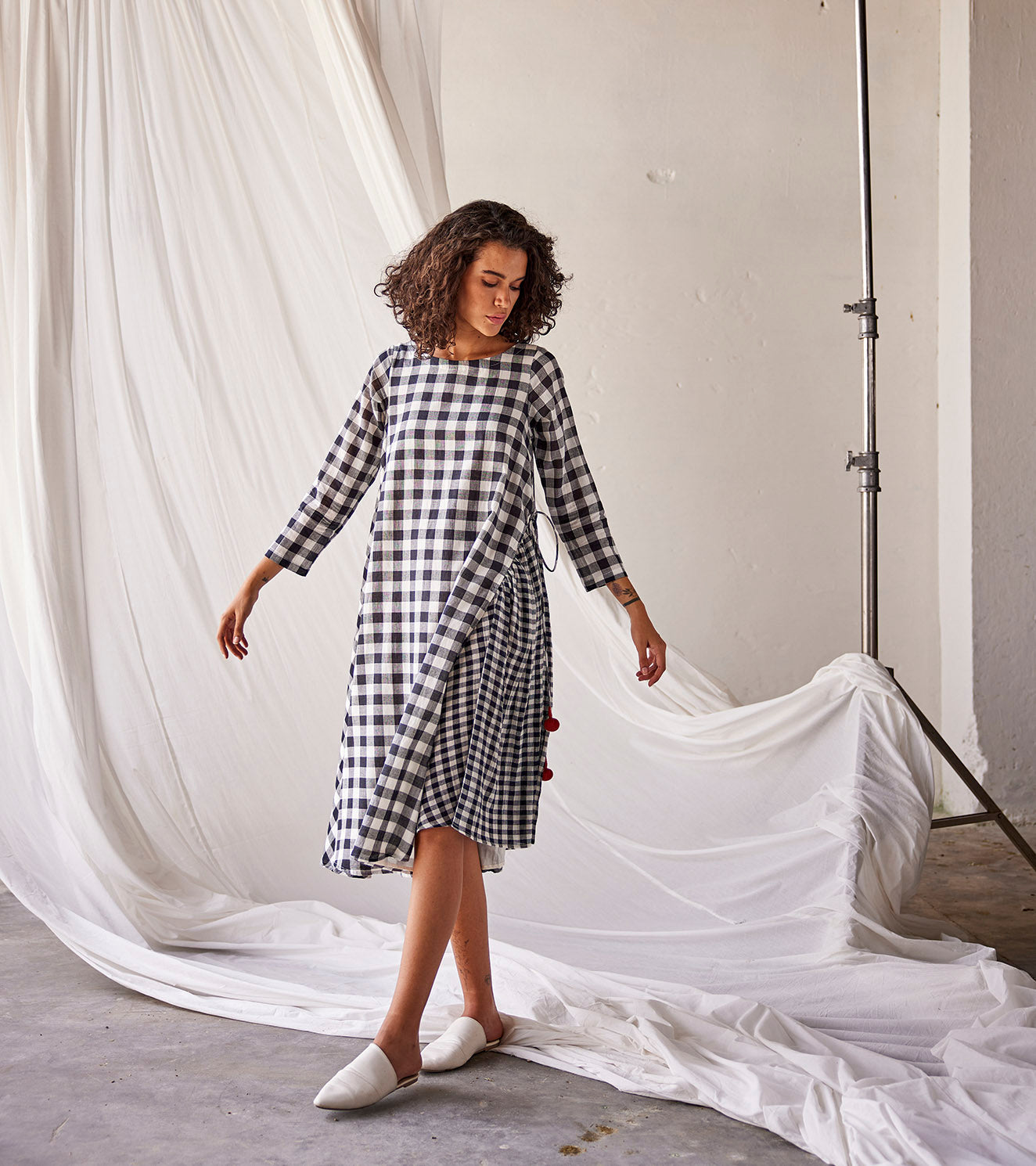 Black and White Cotton Dress at Kamakhyaa by Khara Kapas. This item is An Indian Summer, Black, Casual Wear, Checks, Cotton, Dresses, Midi Dresses, Mulmul cotton, Organic, Relaxed Fit, White, Womenswear