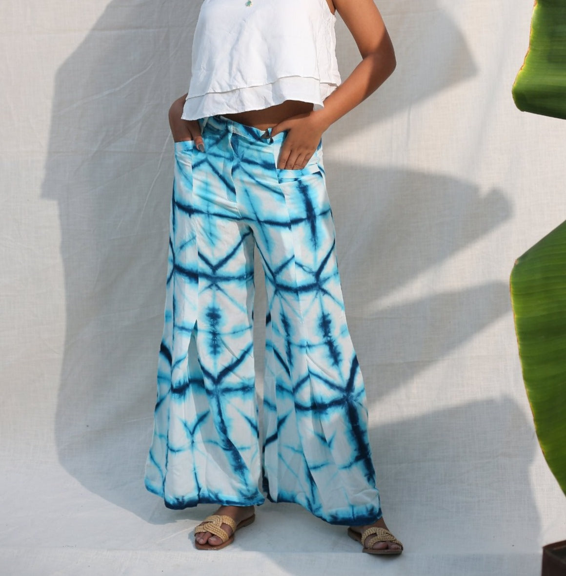 Blue And White Bell Bottom Pants at Kamakhyaa by Keva. This item is Blue, Day Dream, Natural, Palazzo Pants, Rayon, Relaxed Fit, Resort Wear, Tie & Dye, Womenswear