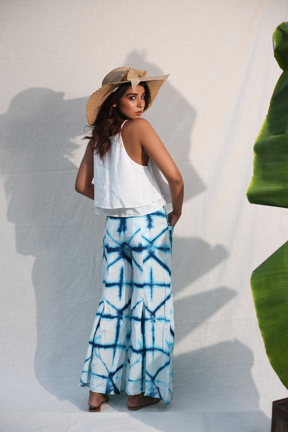 Blue And White Bell Bottom Pants at Kamakhyaa by Keva. This item is Blue, Day Dream, Natural, Palazzo Pants, Rayon, Relaxed Fit, Resort Wear, Tie & Dye, Womenswear