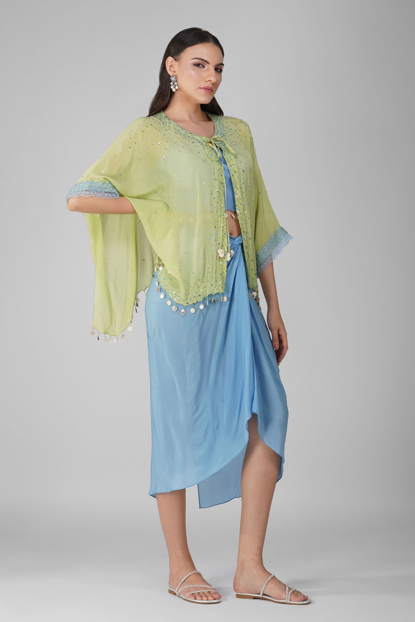 Blue Chiffon Drape skirt and Cape Set at Kamakhyaa by Devyani Mehrotra. This item is Blue, Chiffon, Embellished, Green, Indian Wear, Natural, Party Wear, Regular Fit, Womenswear