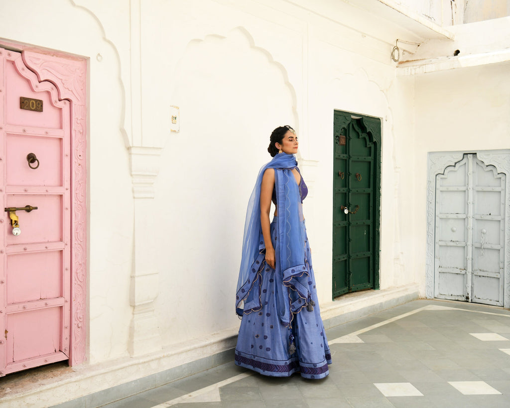 Blue Embroidered Silk Lehenga Set at Kamakhyaa by Taro. This item is Blue, Evening Wear, Handwoven silk, Indian Wear, July Sale, July Sale 2023, Lehenga Sets, Natural, Regular Fit, Sitara Taro, Stripes, Wedding Gifts, Womenswear