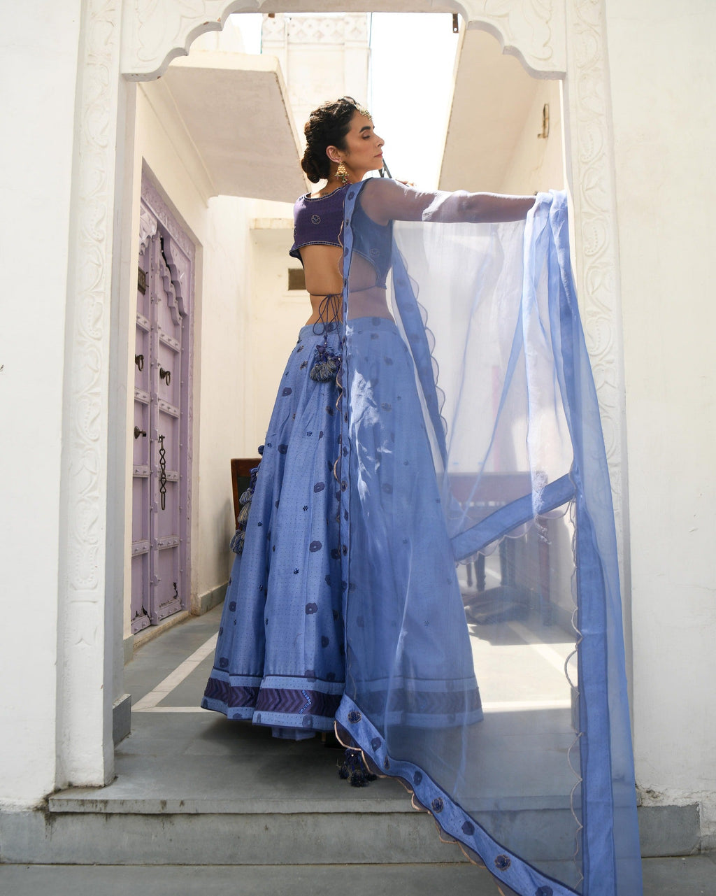 Blue Embroidered Silk Lehenga Set at Kamakhyaa by Taro. This item is Blue, Evening Wear, Handwoven silk, Indian Wear, July Sale, July Sale 2023, Lehenga Sets, Natural, Regular Fit, Sitara Taro, Stripes, Wedding Gifts, Womenswear