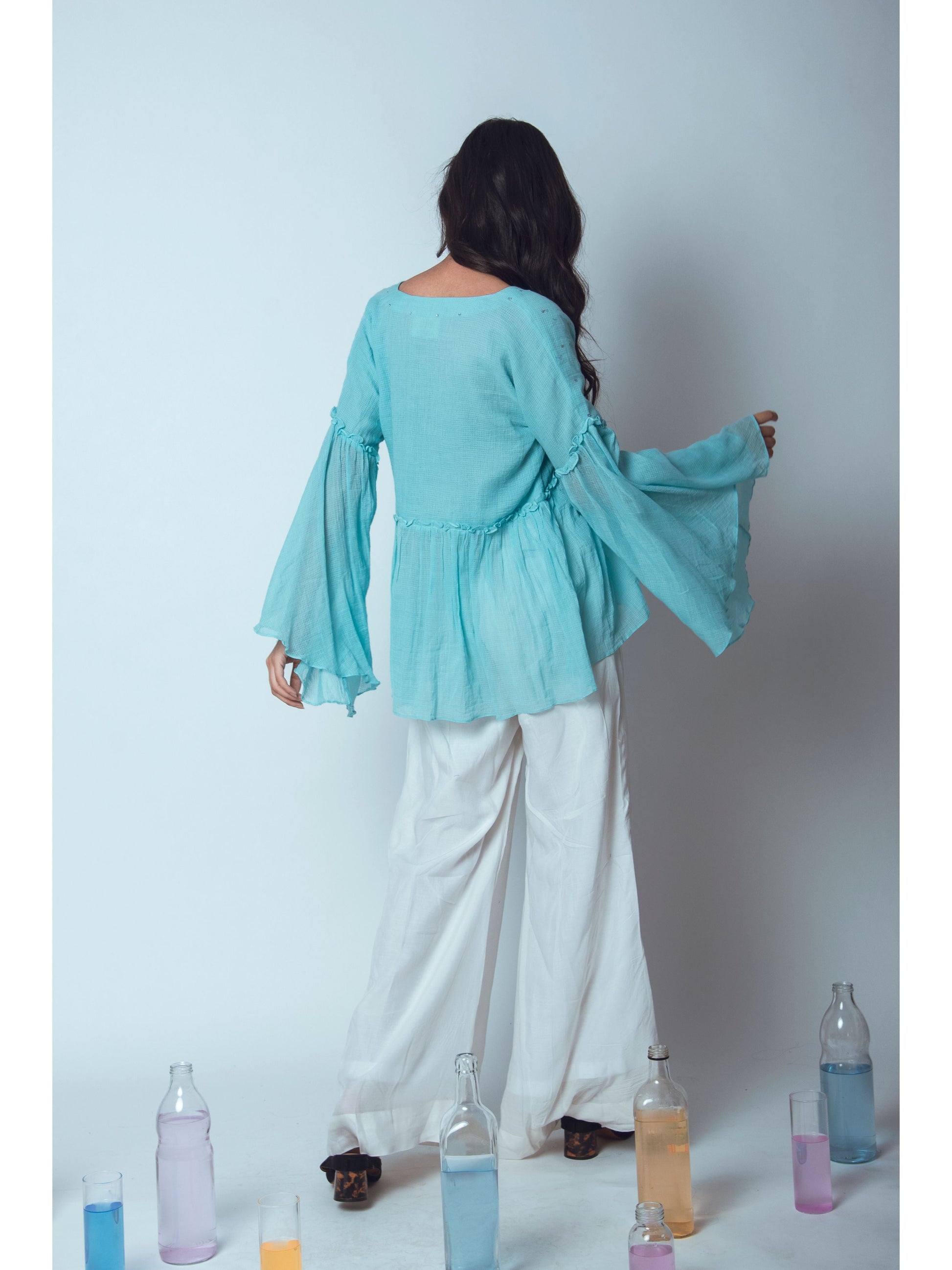 Blue Embroidered Tunic Top at Kamakhyaa by The Loom Art. This item is Blouses, Blue, Euphoria, July Sale, July Sale 2023, kota Slub, Natural, Party Wear, Regular Fit, Tops, Womenswear