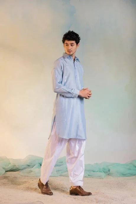 Blue Kurta Salwar Set at Kamakhyaa by Charkhee. This item is Aasmaa, Blue, Chanderi, Cotton, Embellished, Kurta Salwar Sets, Mens Co-ords, Menswear, Natural, Relaxed Fit, Sequin work, Wedding Wear, White