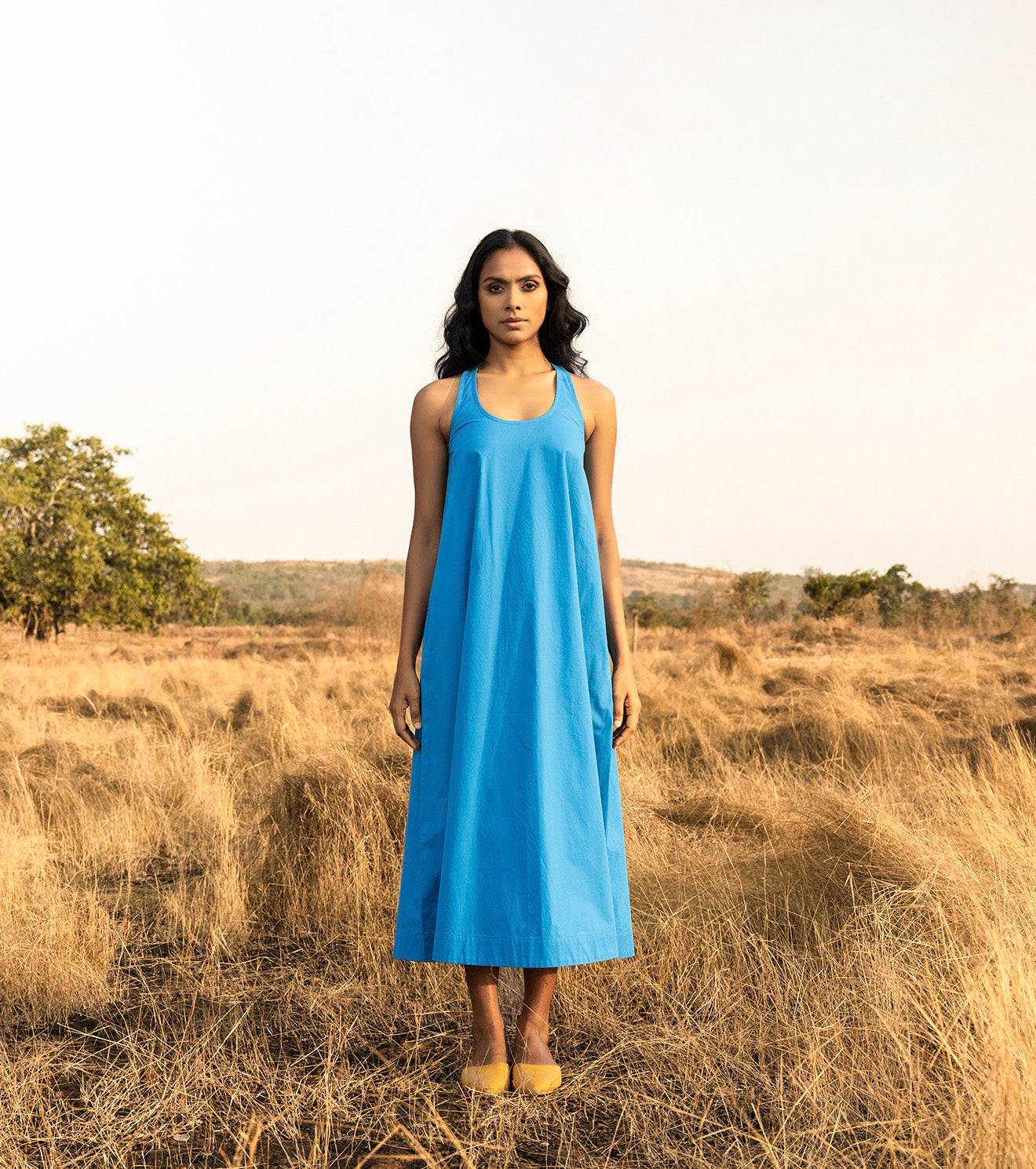 Blue Midi Dress at Kamakhyaa by Khara Kapas. This item is Blue, Cotton, Midi Dresses, Natural, Oh Carol, Regular Fit, Resort Wear, Sleeveless Dresses, Solids, Womenswear