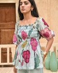 Blue Peplum Top at Kamakhyaa by Taro. This item is Azo Free Dyes, Best Selling, Blue, Casual Wear, Chanderi Silk, Crop Tops, Garden Of Dreams, July Sale, July Sale 2023, Peplum Tops, Prints, Womenswear