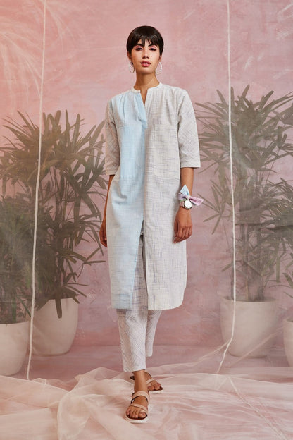 Blue Pocket Kurta with Pant at Kamakhyaa by Charkhee. This item is Blue, Casual Wear, Cotton Blend, Indian Wear, Kurta Pant Sets, Natural, Regular Fit, Textured, White, Womenswear