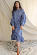 Blue Ruffle Full Sleeves Dress at Kamakhyaa by Chambray & Co.. This item is Blue, Casual Wear, Cotton, Midi Dresses, Natural, Regular Fit, Ruffle Dresses, Solids, Tiered Dresses, Womenswear