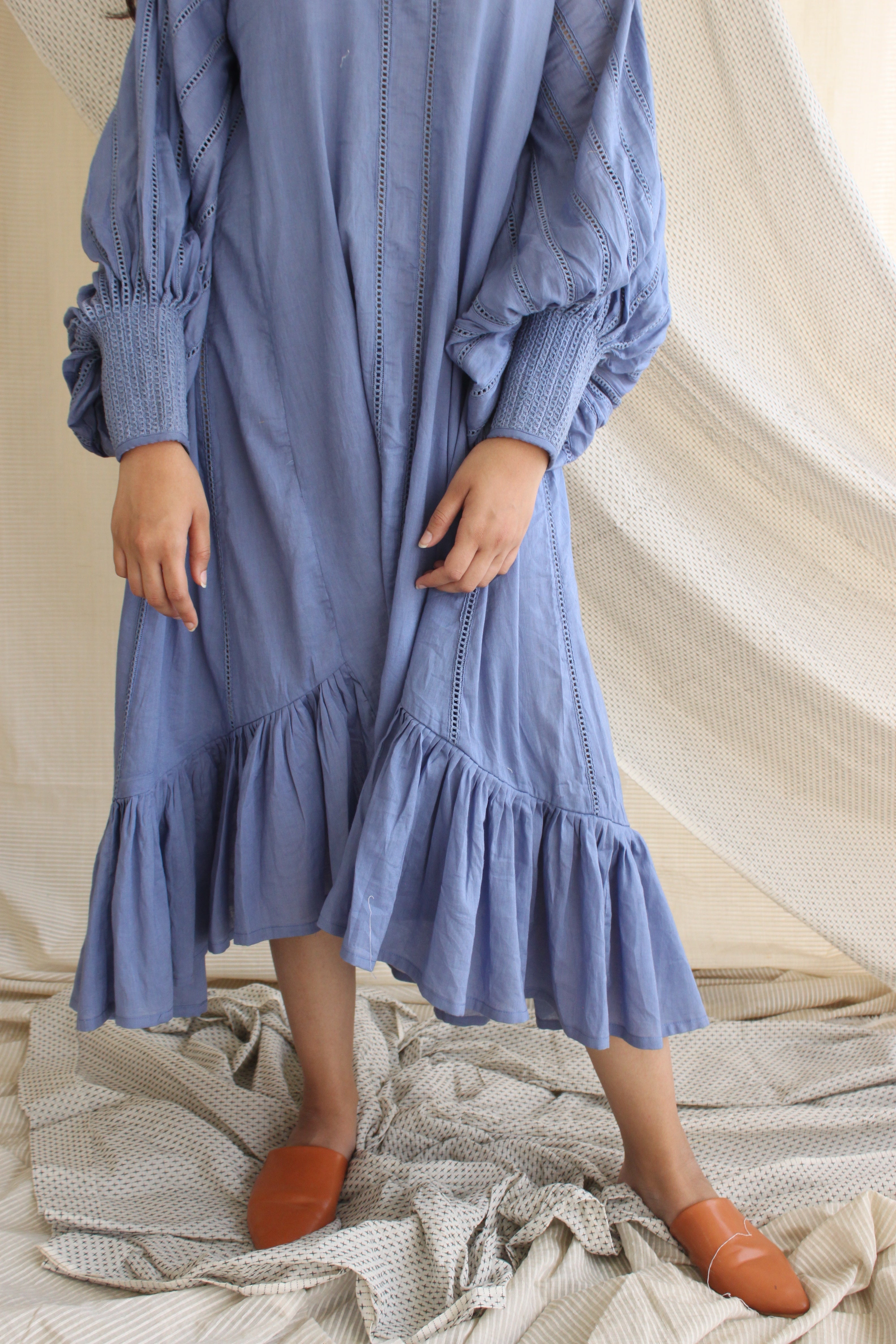 Blue Ruffle Full Sleeves Dress at Kamakhyaa by Chambray & Co.. This item is Blue, Casual Wear, Cotton, Midi Dresses, Natural, Regular Fit, Ruffle Dresses, Solids, Tiered Dresses, Womenswear