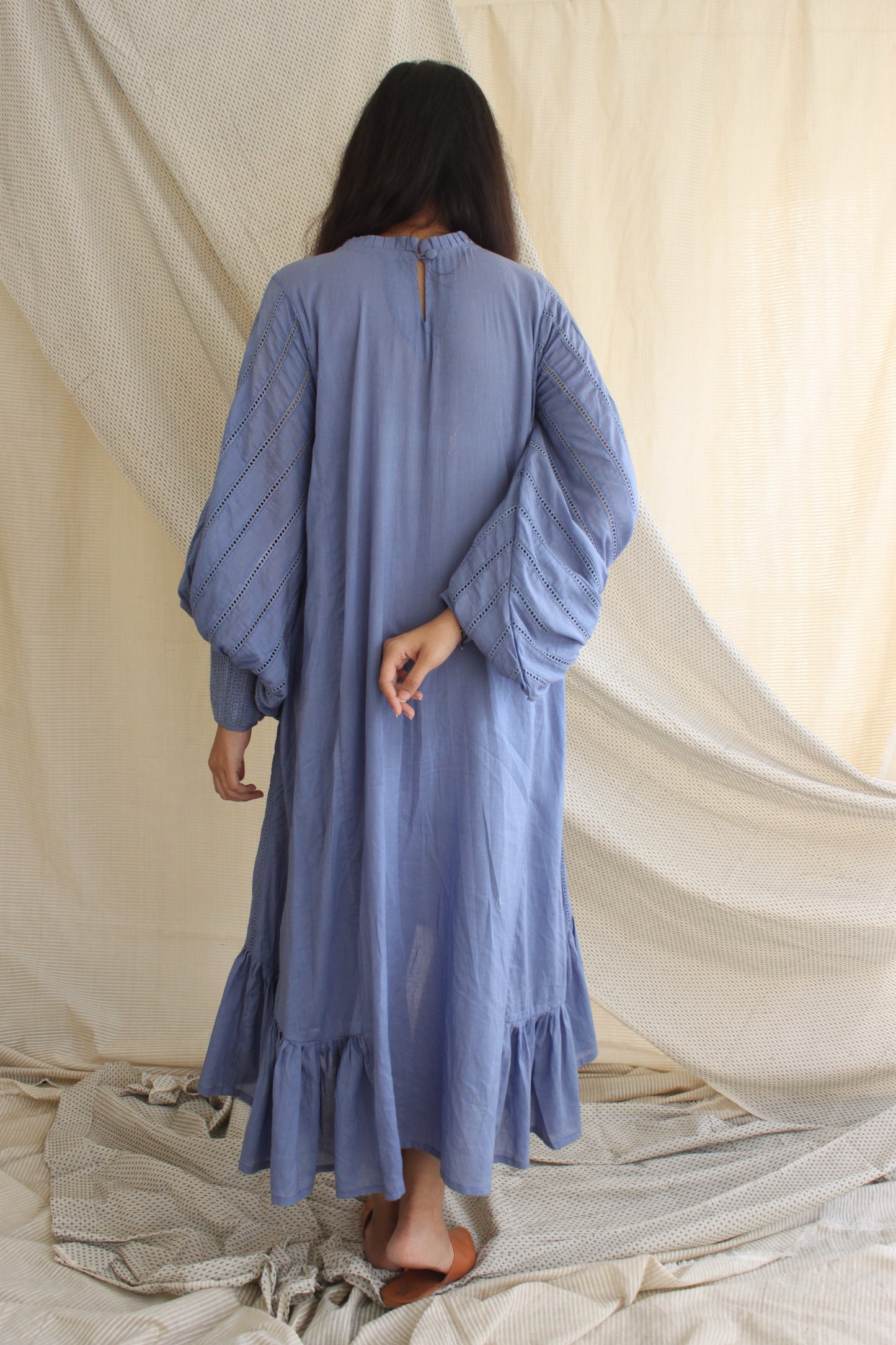 Blue Ruffle Full Sleeves Dress at Kamakhyaa by Chambray & Co.. This item is Blue, Casual Wear, Cotton, Midi Dresses, Natural, Regular Fit, Ruffle Dresses, Solids, Tiered Dresses, Womenswear