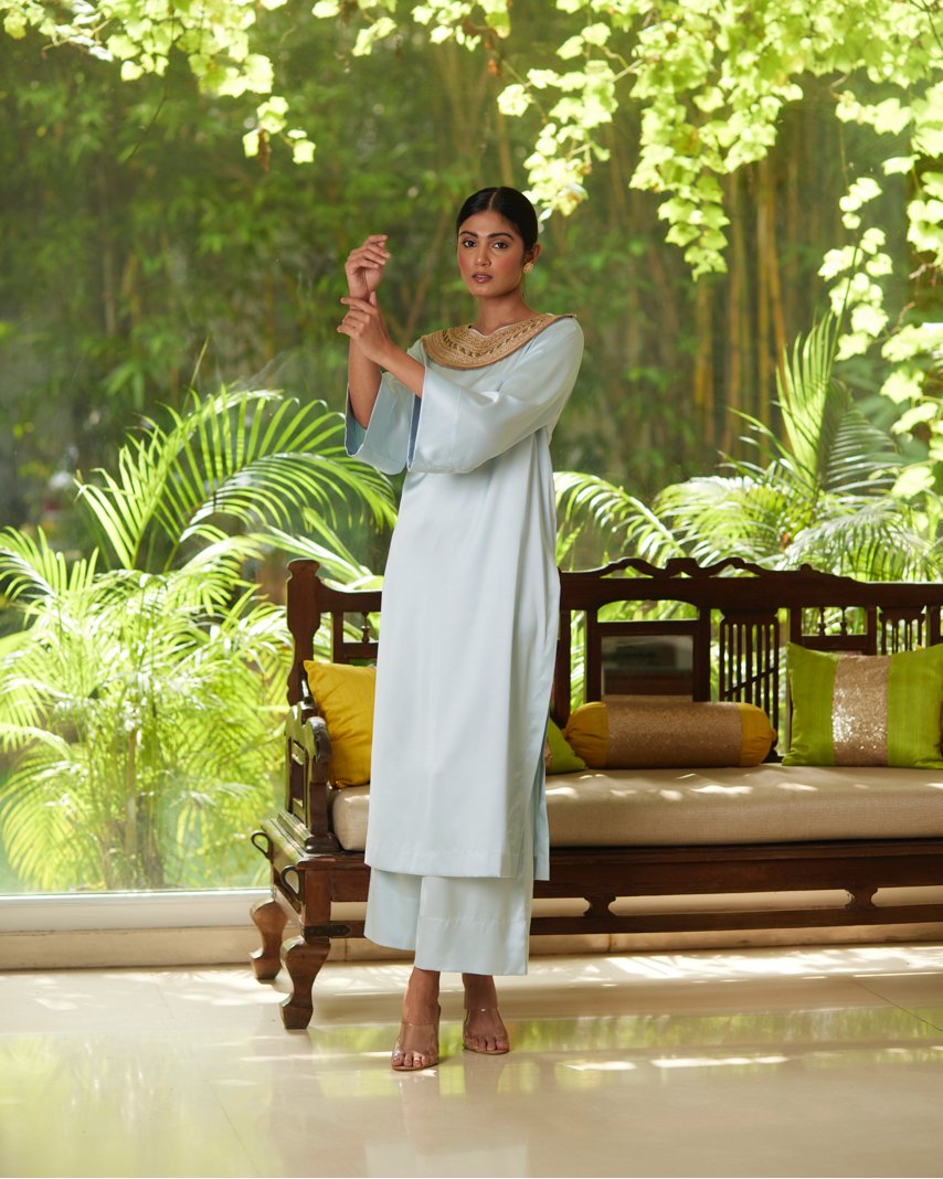 Blue Satin Silk Kurta Pant Set at Kamakhyaa by Mayura Kumar. This item is Blue, Casual Wear, Festive Wear, Kurta Pant Sets, Mayura Kumar, Regular Fit, Satin, Silk, Solids, Timeless Elegance, Womenswear