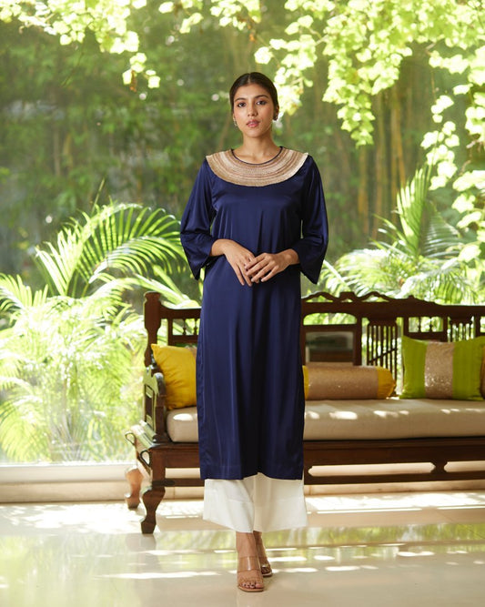 Blue Satin Silk Kurta Set at Kamakhyaa by Mayura Kumar. This item is Blue, Casual Wear, Festive Wear, Kurta Pant Sets, Mayura Kumar, Regular Fit, Satin, Silk, Solids, Timeless Elegance, Womenswear