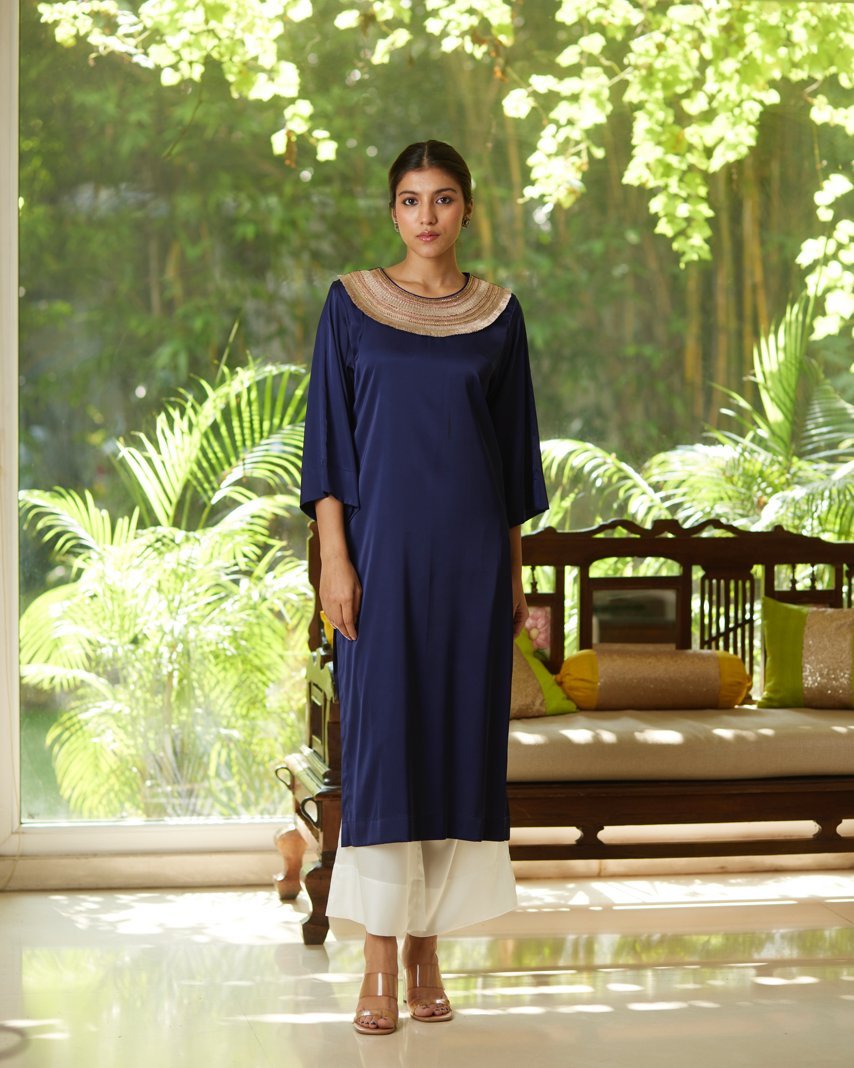 Blue Satin Silk Kurta Set at Kamakhyaa by Mayura Kumar. This item is Blue, Casual Wear, Festive Wear, Kurta Pant Sets, Mayura Kumar, Regular Fit, Satin, Silk, Solids, Timeless Elegance, Womenswear