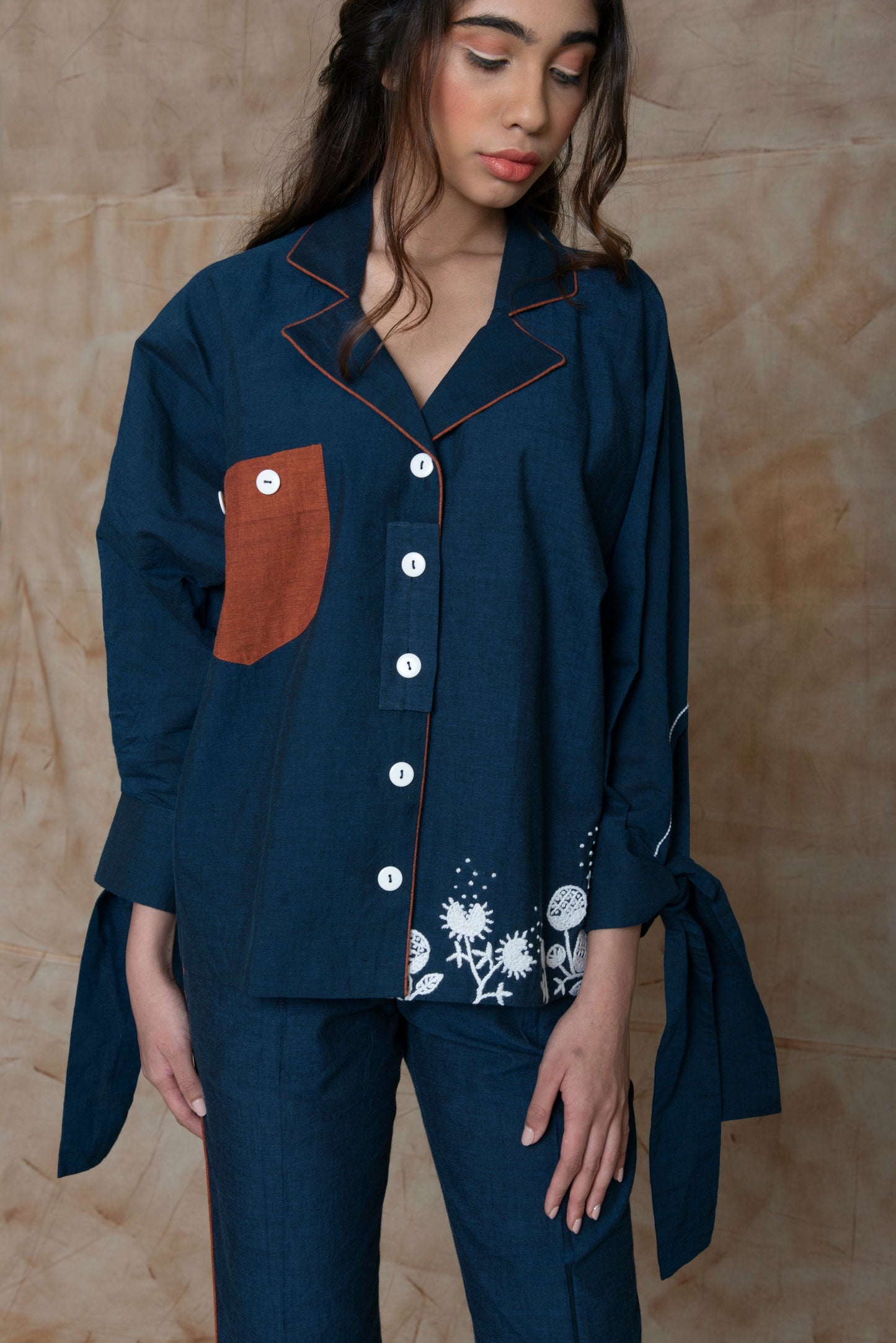 Blue Shirt with shell tucks collar at Kamakhyaa by Anushé Pirani. This item is Blue, Embroidered, Handwoven Cotton, July Sale, July Sale 2023, Natural, Ocean of Stories, Office Wear, Regular Fit, sale anushe pirani, Shirts, Tops, Womenswear