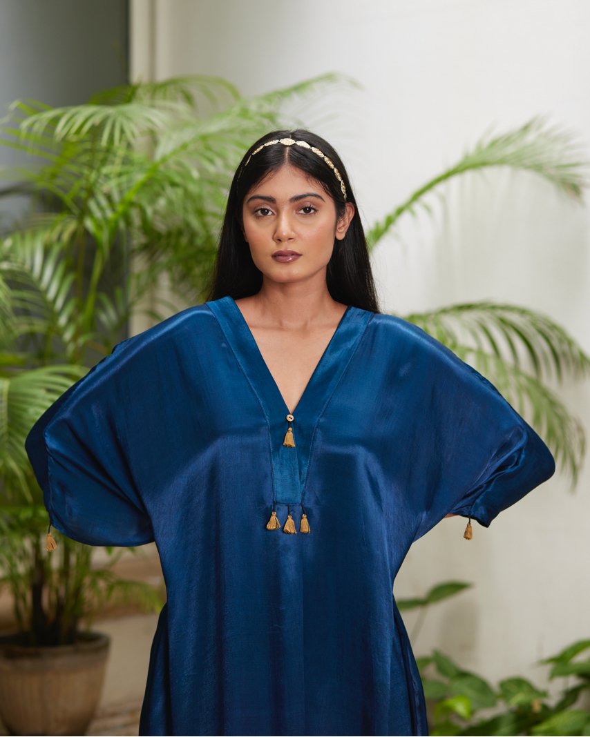 Blue Silk Kaftan With Golden Border at Kamakhyaa by Mayura Kumar. This item is Ajrakh Heritage, Blue, Casual Wear, Dresses, Festive Wear, Kaftans, Mayura Kumar, Modal Silk, Relaxed Fit, Solids, Womenswear