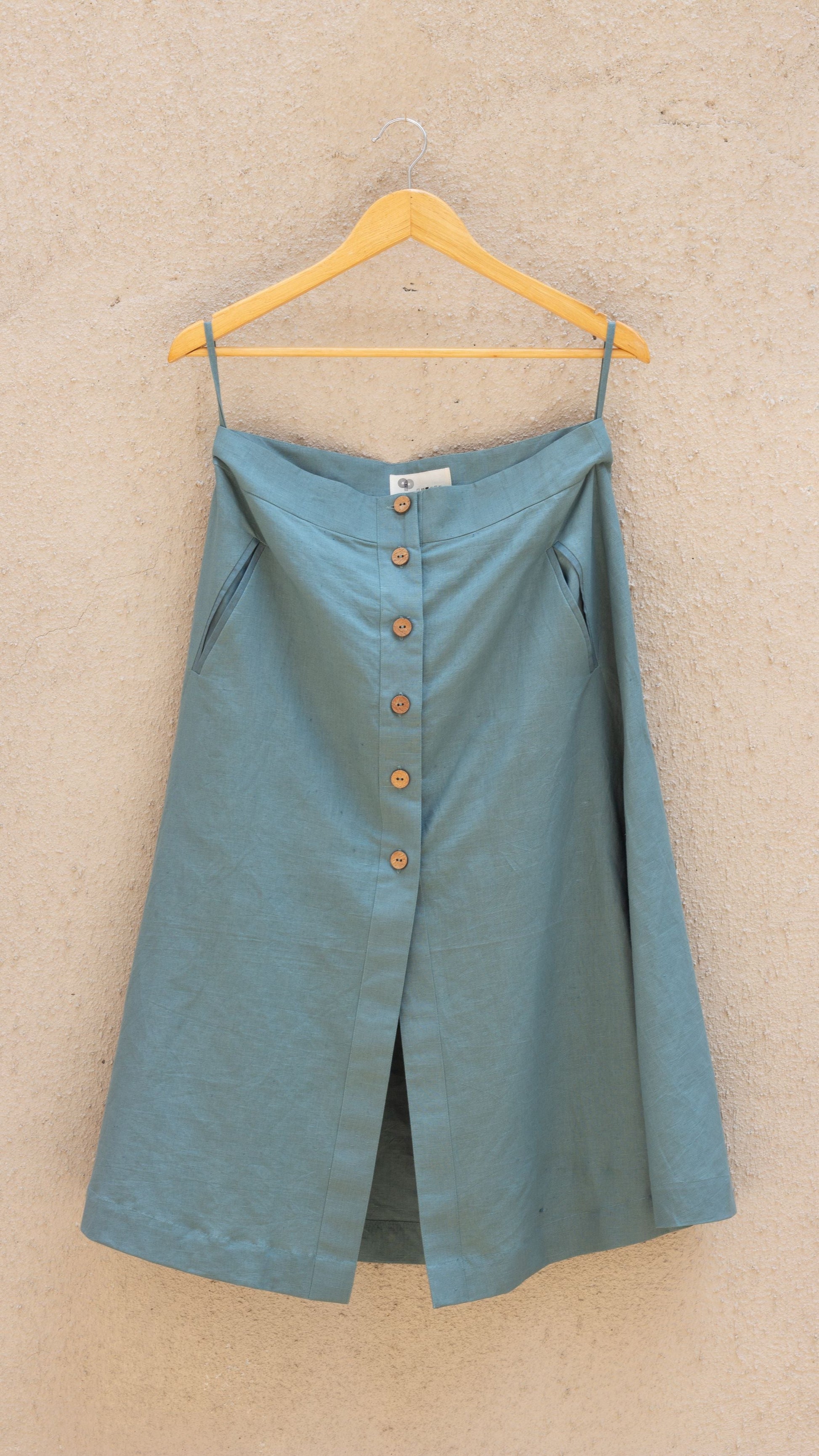 Blue Solid Midi Skirt at Kamakhyaa by Anushé Pirani. This item is Blue, Casual Wear, Cotton, Cotton Hemp, Handwoven, Hemp, Midi Skirts, Regular Fit, Shibumi Collection, Skirts, Solids, Womenswear