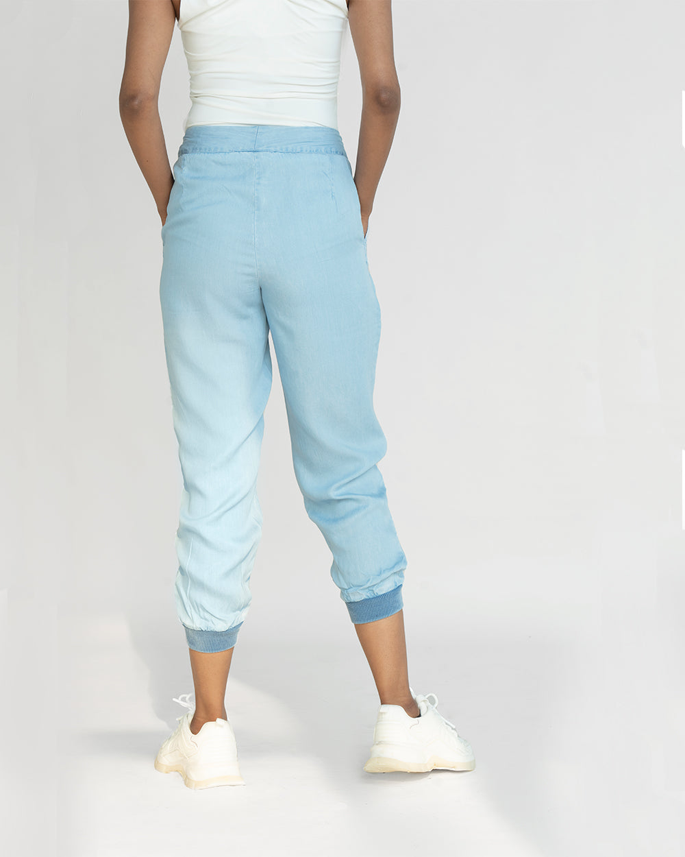 Blue Tencel Pants at Kamakhyaa by Reistor. This item is Blue, Denim, Joggers, Natural, Office Wear, Regular Fit, Solids, Tencel, Womenswear