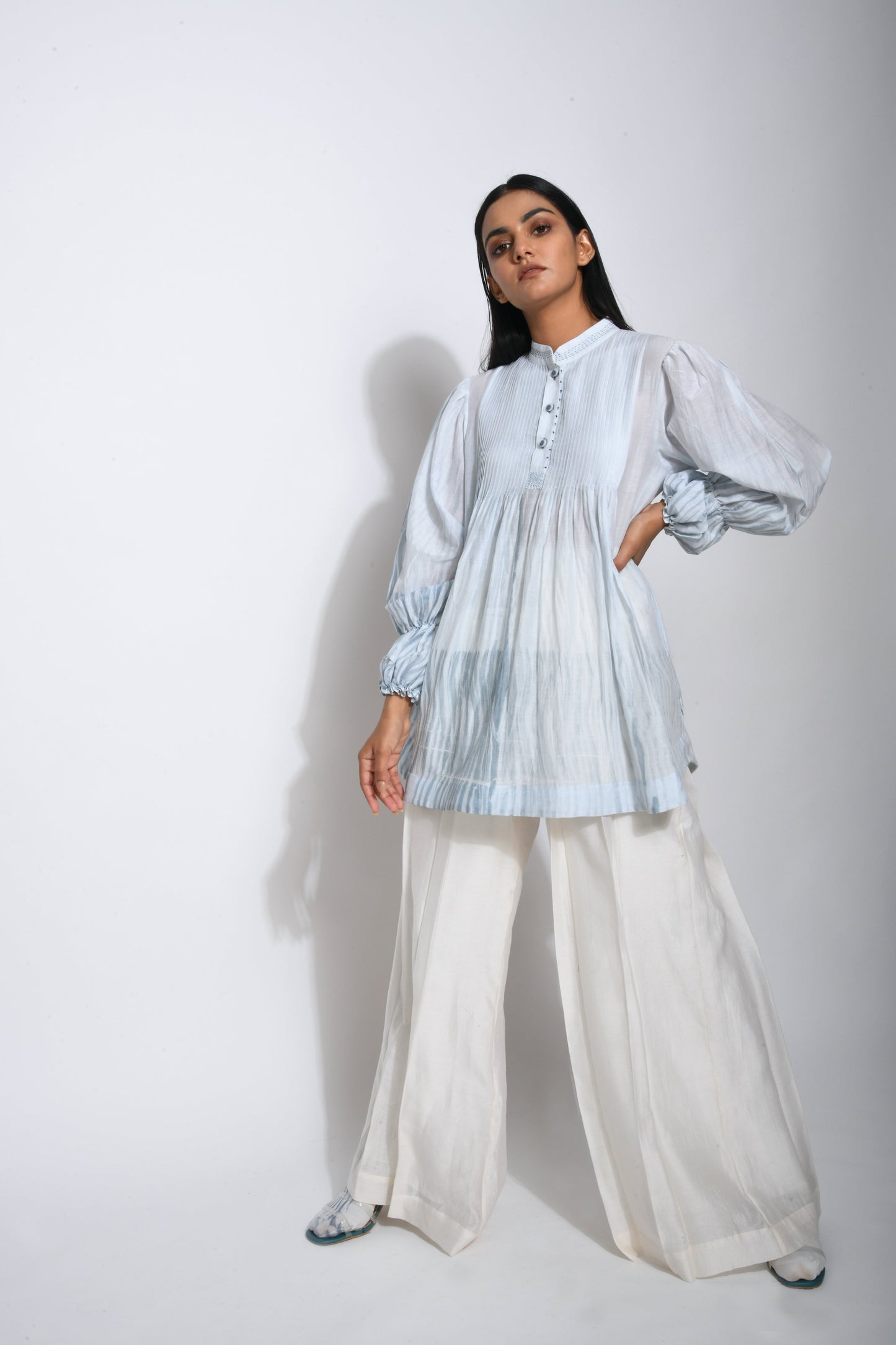 Blue Textured Top at Kamakhyaa by The Loom Art. This item is Best Selling, Between the Lines, Blue, For Mother, For Mother W, Handwoven cotton silk, July Sale, July Sale 2023, Natural, Party Wear, Regular Fit, Solids, Tops, Tunic Tops, Womenswear
