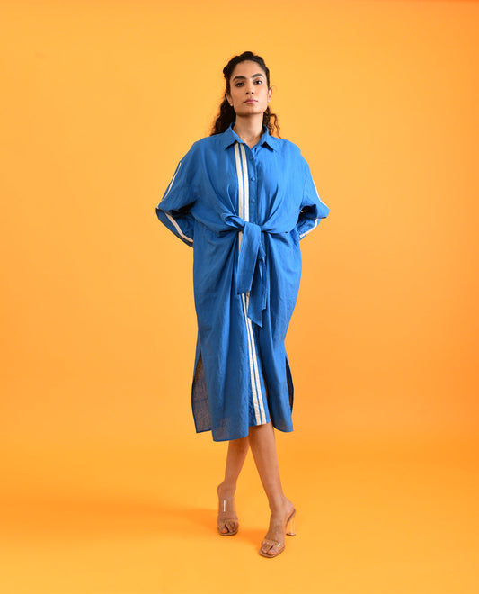 Blue Tie Up Midi Dress at Kamakhyaa by Rias Jaipur. This item is Blue, Casual Wear, For Anniversary, Handloom Cotton, Handspun, Handwoven, Hue, Midi Dresses, Relaxed Fit, Shirt Dresses, solid, Solids, Stripes, Womenswear