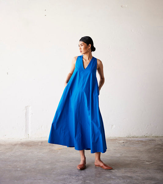 Blue V Neck Poplin Dress With Criss Cross Back at Kamakhyaa by Khara Kapas. This item is An Indian Summer, Blue, Casual Wear, Dresses, Organic, Poplin, Relaxed Fit, Solids, Womenswear