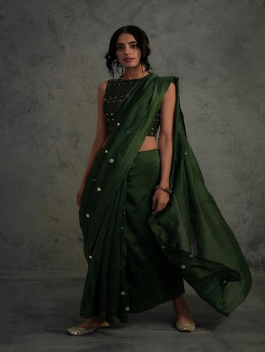 Bottle Green Chanderi Saree With Blouse at Kamakhyaa by Charkhee. This item is Blue, Chanderi, Cotton, Embellished, Ethnic Wear, Green, Indian Wear, Mirror Work, Natural, Relaxed Fit, Saree Sets, Tyohaar, Womenswear