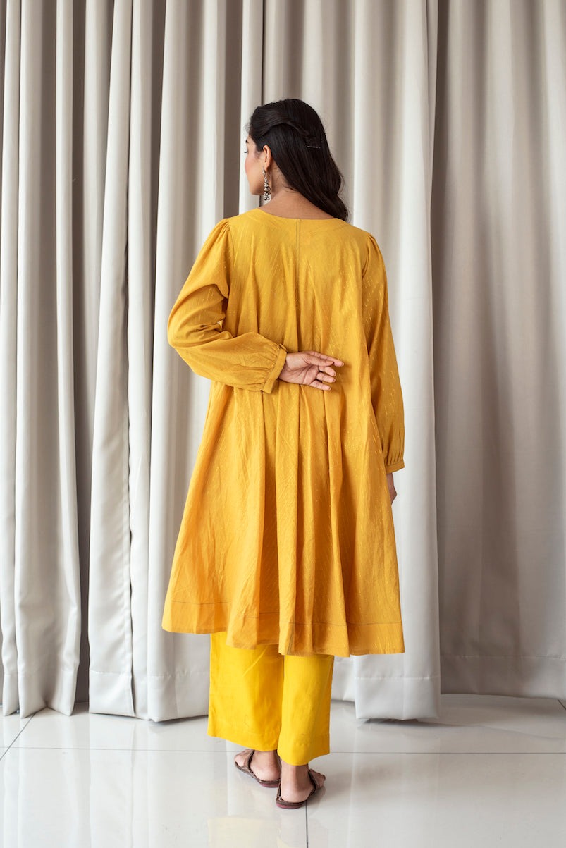 Bright Mustard Kurta Set at Kamakhyaa by Taro. This item is Bahaar Taro, Evening Wear, Handloom Cotton, Indian Wear, July Sale, July Sale 2023, Kurta Pant Sets, Natural, Relaxed Fit, Womenswear, Yellow