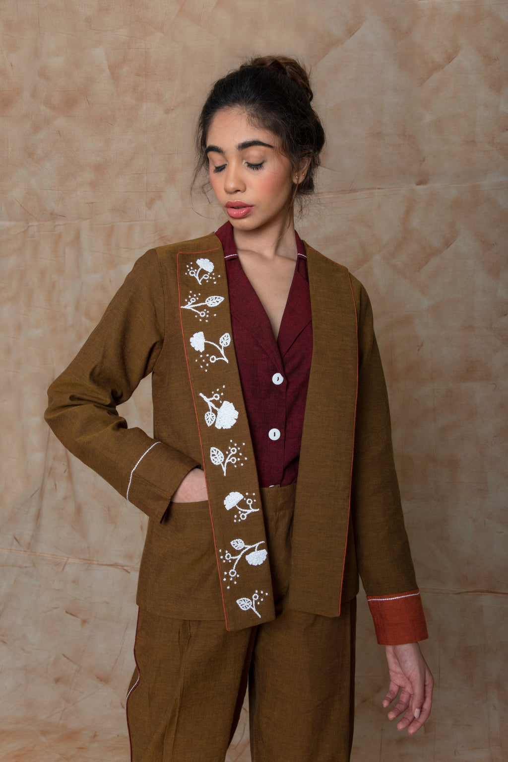 Brown Custom Jacket at Kamakhyaa by Anushé Pirani. This item is Brown, Embroidered, fall, Handwoven Cotton, Jackets, July Sale, July Sale 2023, Natural, Ocean of Stories, Office Wear, Relaxed Fit, sale anushe pirani, Womenswear
