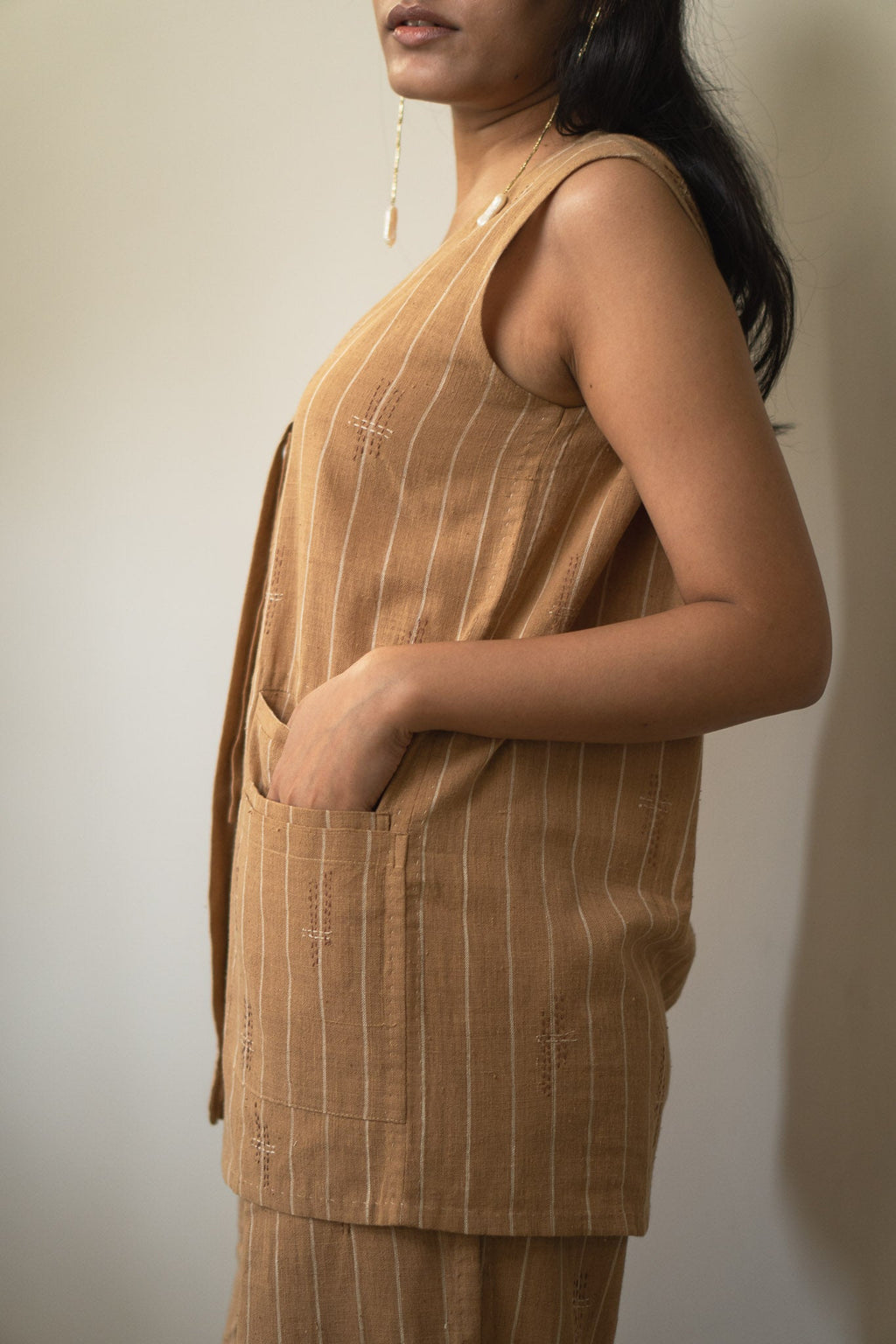 Brown Long Vest at Kamakhyaa by Lafaani. This item is 100% pure cotton, Brown, Casual Wear, Jackets, Materiality, Natural with azo dyes, Organic, Regular Fit, Solids, Undyed and Unbleached, Womenswear