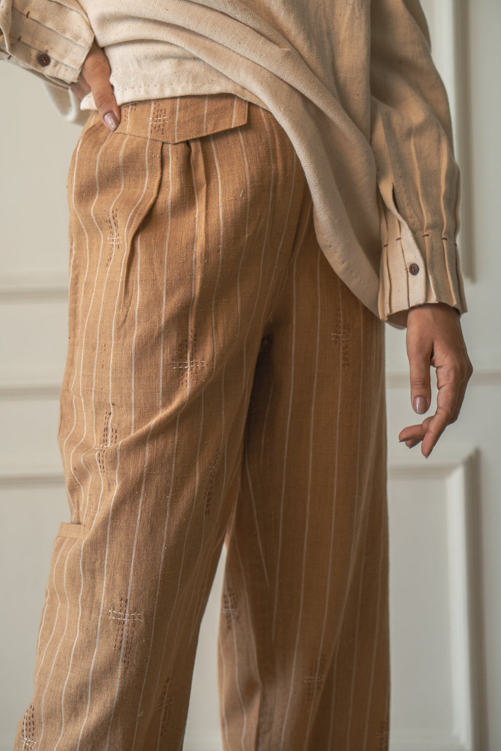 Brown Tapered Pants at Kamakhyaa by Lafaani. This item is 100% pure cotton, Brown, Casual Wear, Materiality, Organic, Regular Fit, Shirts, Solids, Unbleached and Undyed, Womenswear