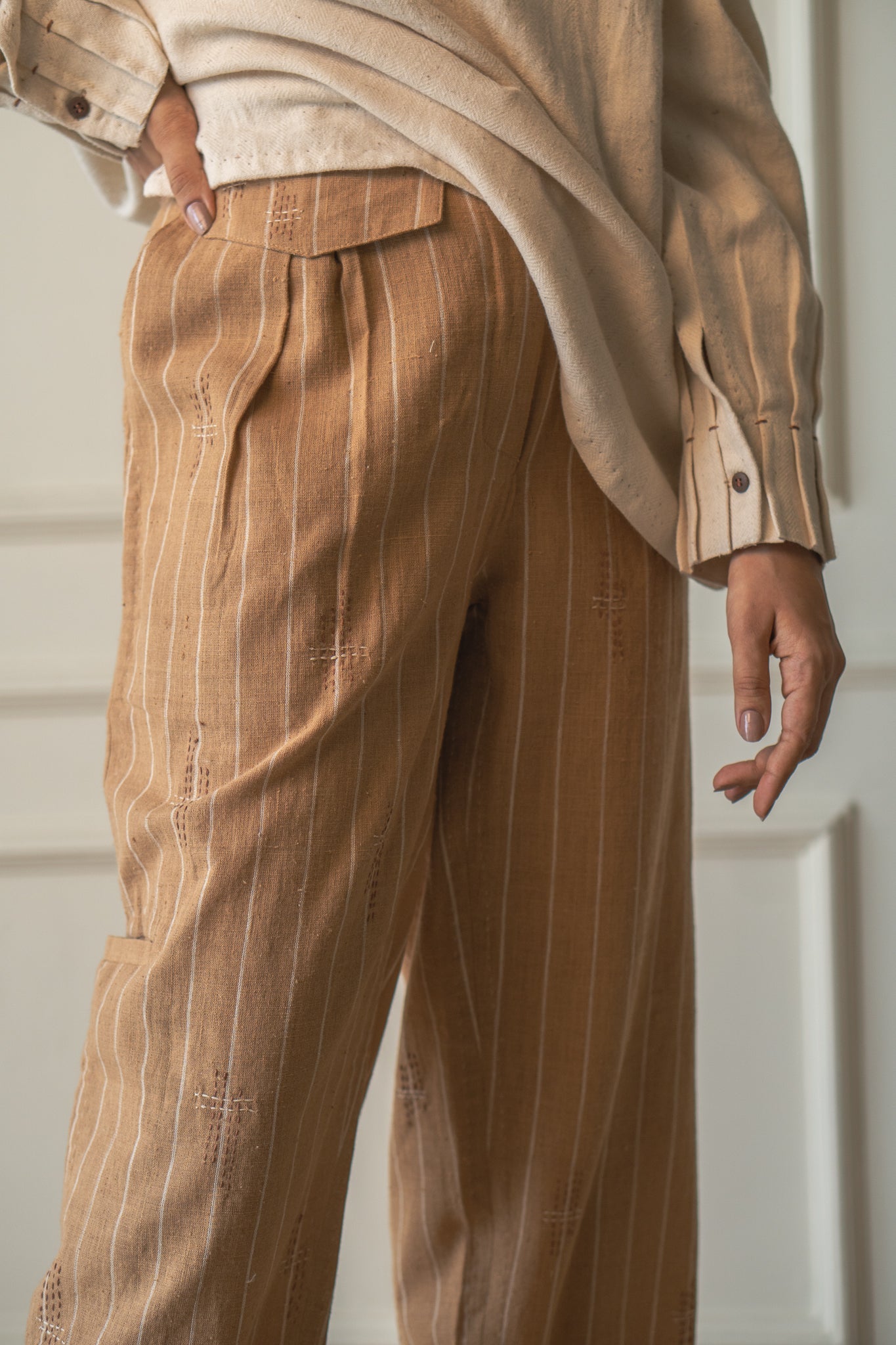 Brown Tapered Pants at Kamakhyaa by Lafaani. This item is 100% pure cotton, Brown, Casual Wear, Materiality, Organic, Regular Fit, Shirts, Solids, Unbleached and Undyed, Womenswear