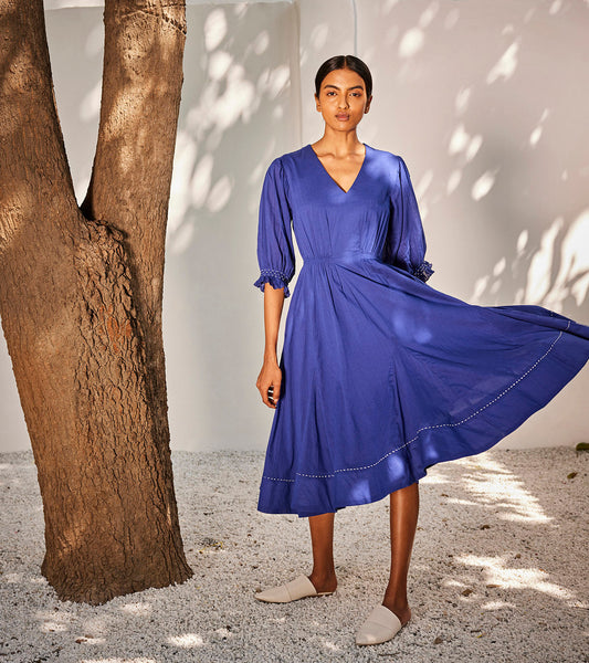 Bustling wind dress at Kamakhyaa by Khara Kapas. This item is Blue, Casual Wear, Cotton Poplin, Midi Dresses, Oh! Sussana Spring 2023, Organic, Regular Fit, Solids, Womenswear