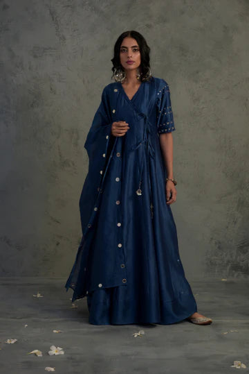 Chanderi Angrakha Wrap Dress With Jogger at Kamakhyaa by Charkhee. This item is Angrakha, Blue, Chanderi, Cotton, Embellished, Ethnic Wear, Indian Wear, Kurta Pant Sets, Kurta Set With Dupatta, Mirror Work, Natural, Relaxed Fit, Tyohaar, Wedding Gifts, Womenswear