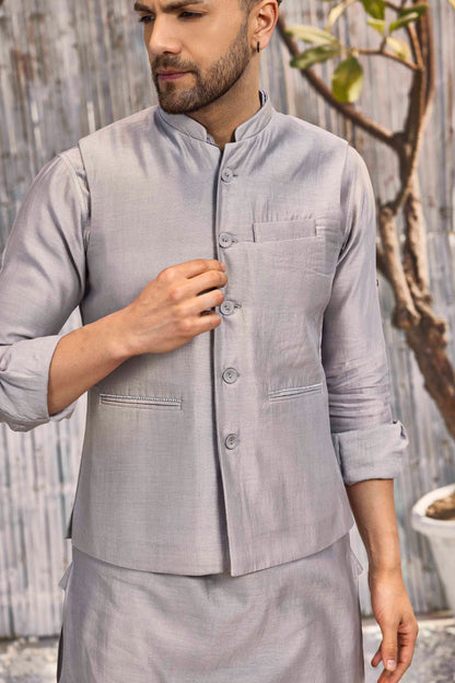 Chanderi Bundi Jacket - Grey at Kamakhyaa by Charkhee. This item is Cotton, Festive Wear, Grey, Indian Wear, Indianwear Jackets, Jackets, Mens Overlay, Menswear, Natural, Regular Fit, Schiffli, Shores 23, Solids