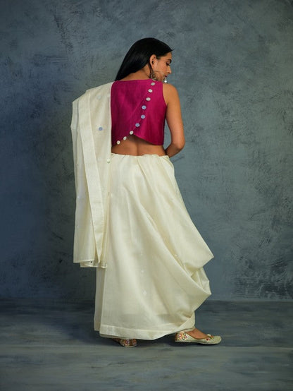 Chanderi Off-white Saree With Bright Pink Blouse at Kamakhyaa by Charkhee. This item is Chanderi, Cotton, Embellished, Ethnic Wear, Indian Wear, Mirror Work, Natural, Pink, Relaxed Fit, Saree Sets, Tyohaar, White, Womenswear