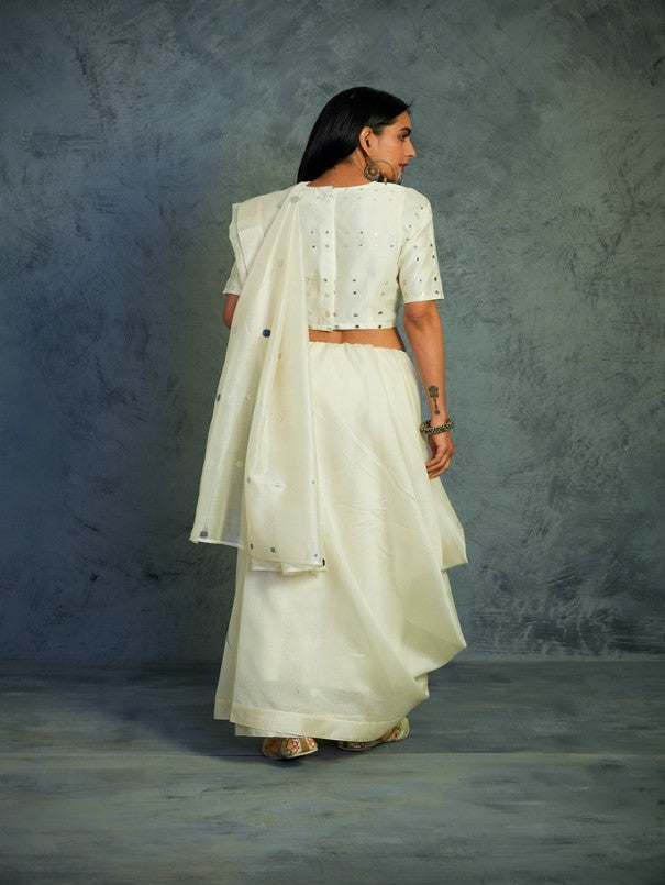 Chanderi Off-white Saree With Off-white Blouse at Kamakhyaa by Charkhee. This item is Chanderi, Cotton, Embellished, Ethnic Wear, Indian Wear, Mirror Work, Natural, Relaxed Fit, Saree Sets, Tyohaar, White, Womenswear