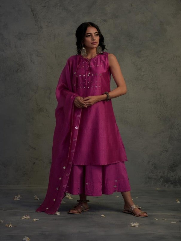 Chanderi Tasseled Sleeveless Kurta Set at Kamakhyaa by Charkhee. This item is Chanderi, Cotton, Embellished, Ethnic Wear, Indian Wear, Kurta Palazzo Sets, Mirror Work, Natural, Pink, Relaxed Fit, Tyohaar, Womenswear