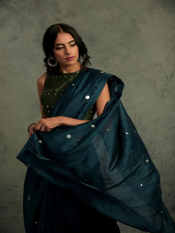 Chanderi Teal Blue Saree With Blouse at Kamakhyaa by Charkhee. This item is Blue, Chanderi, Cotton, Embellished, Ethnic Wear, Green, Indian Wear, Mirror Work, Natural, Relaxed Fit, Saree Sets, Tyohaar, Womenswear