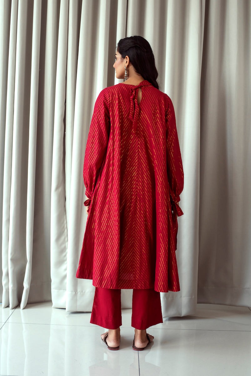 Cranberry Red Kurta Set at Kamakhyaa by Taro. This item is Bahaar Taro, Best Selling, Evening Wear, Handwoven cotton, Indian Wear, Indo-Western, July Sale, July Sale 2023, Kurta Pant Sets, Natural, Red, Relaxed Fit, Textured, Womenswear