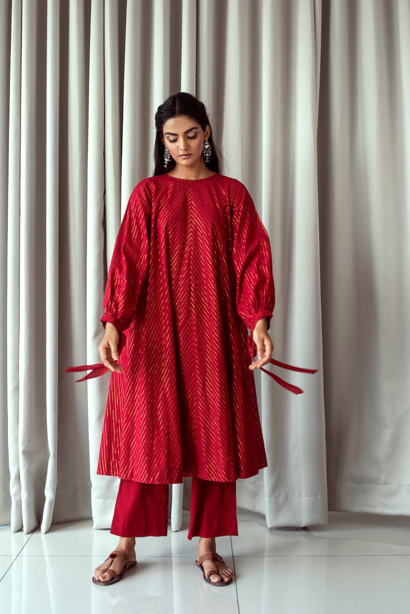 Cranberry Red Kurta Set at Kamakhyaa by Taro. This item is Bahaar Taro, Best Selling, Evening Wear, Handwoven cotton, Indian Wear, Indo-Western, July Sale, July Sale 2023, Kurta Pant Sets, Natural, Red, Relaxed Fit, Textured, Womenswear