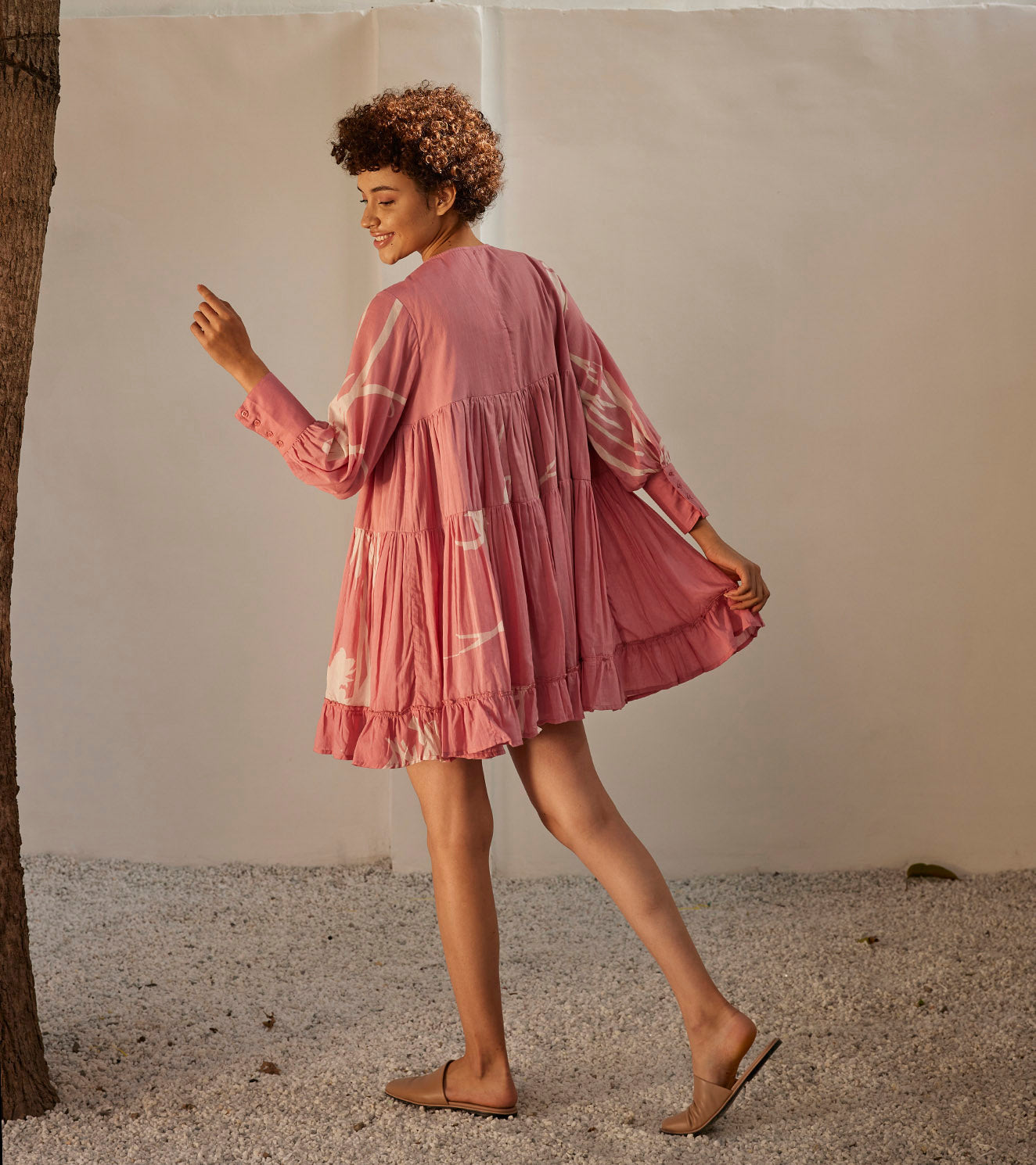 Daffodil Dress at Kamakhyaa by Khara Kapas. This item is Best Selling, Casual Wear, For Birthday, Mini Dresses, Mul Cotton, Oh! Sussana Spring 2023, Organic, Pink, Prints, Relaxed Fit, Shirt Dresses, Tiered Dresses, Womenswear