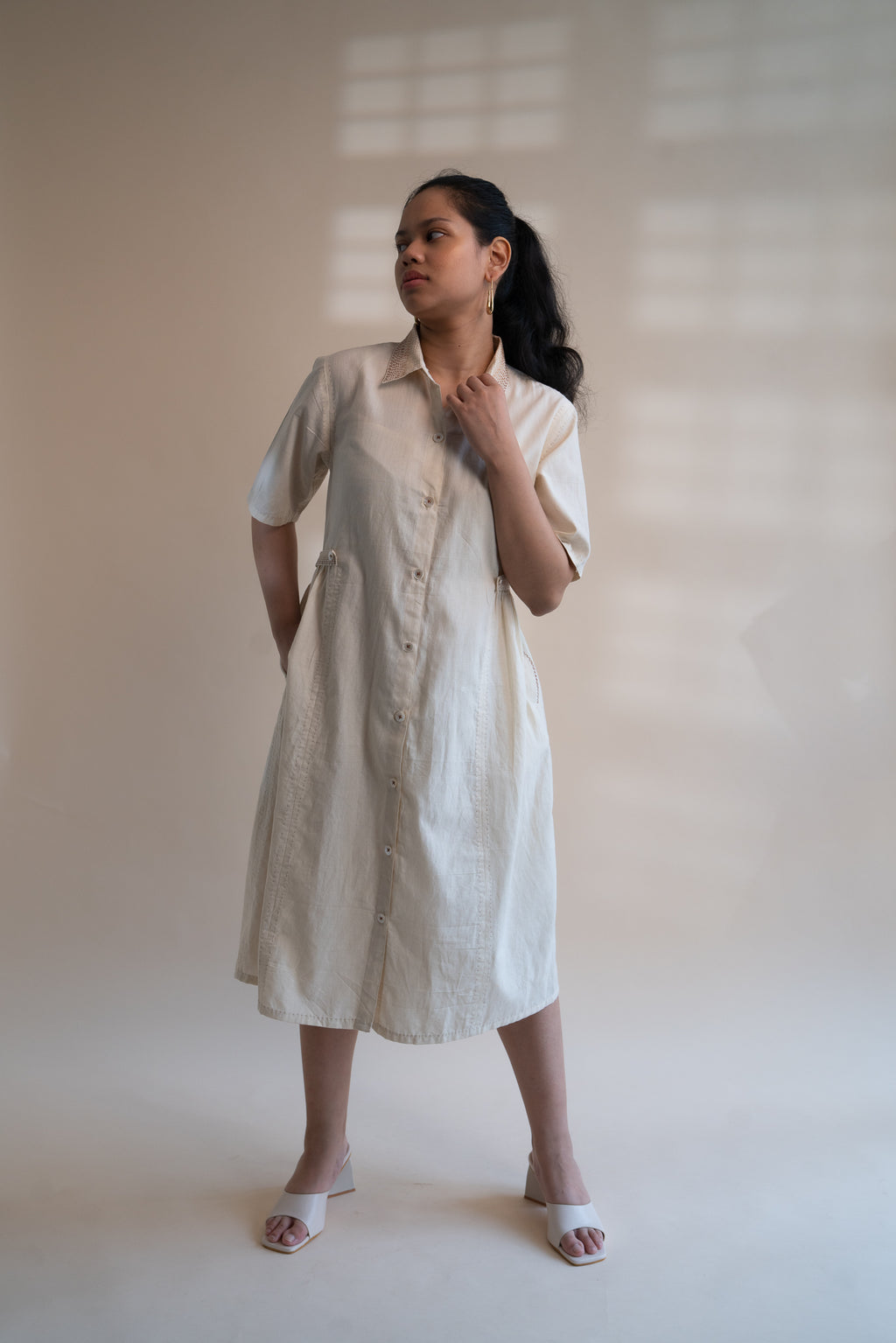 Dawning Button Down Dress at Kamakhyaa by Lafaani. This item is Beige, Casual Wear, Denim, Embroidered, Hand Woven Cotton, Kora, Natural, Regular Fit, Shirt Dresses, Shirts, Womenswear