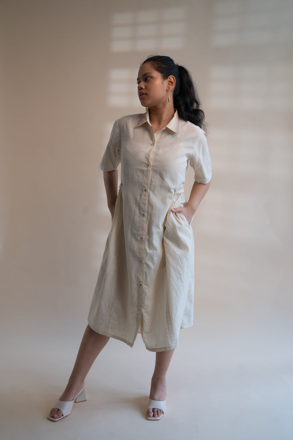 Dawning Button Down Dress at Kamakhyaa by Lafaani. This item is Beige, Casual Wear, Denim, Embroidered, Hand Woven Cotton, Kora, Natural, Regular Fit, Shirt Dresses, Shirts, Womenswear