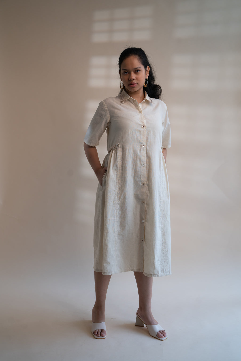 Dawning Button Down Dress at Kamakhyaa by Lafaani. This item is Beige, Casual Wear, Denim, Embroidered, Hand Woven Cotton, Kora, Natural, Regular Fit, Shirt Dresses, Shirts, Womenswear