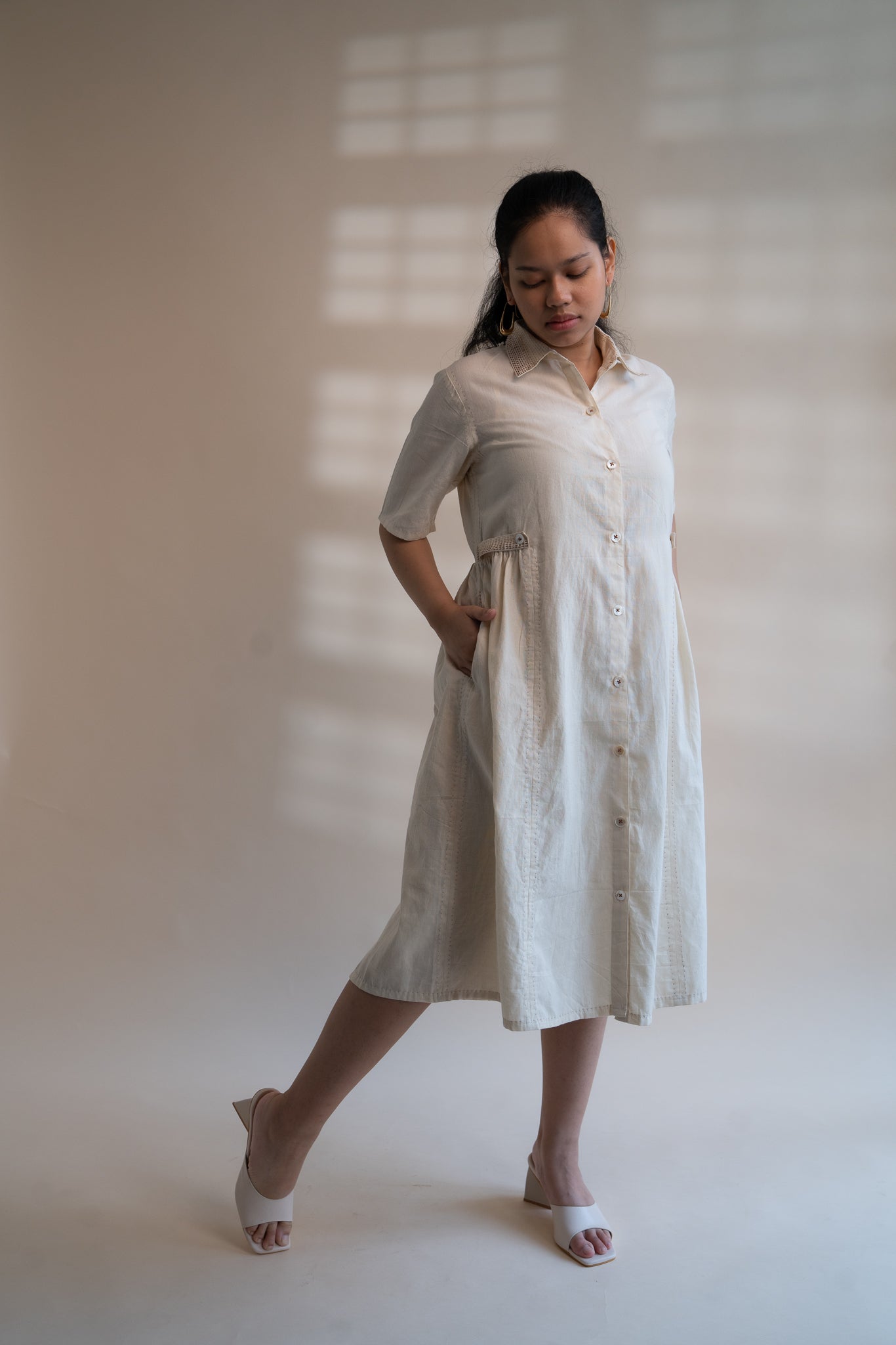 Dawning Button Down Dress at Kamakhyaa by Lafaani. This item is Beige, Casual Wear, Denim, Embroidered, Hand Woven Cotton, Kora, Natural, Regular Fit, Shirt Dresses, Shirts, Womenswear