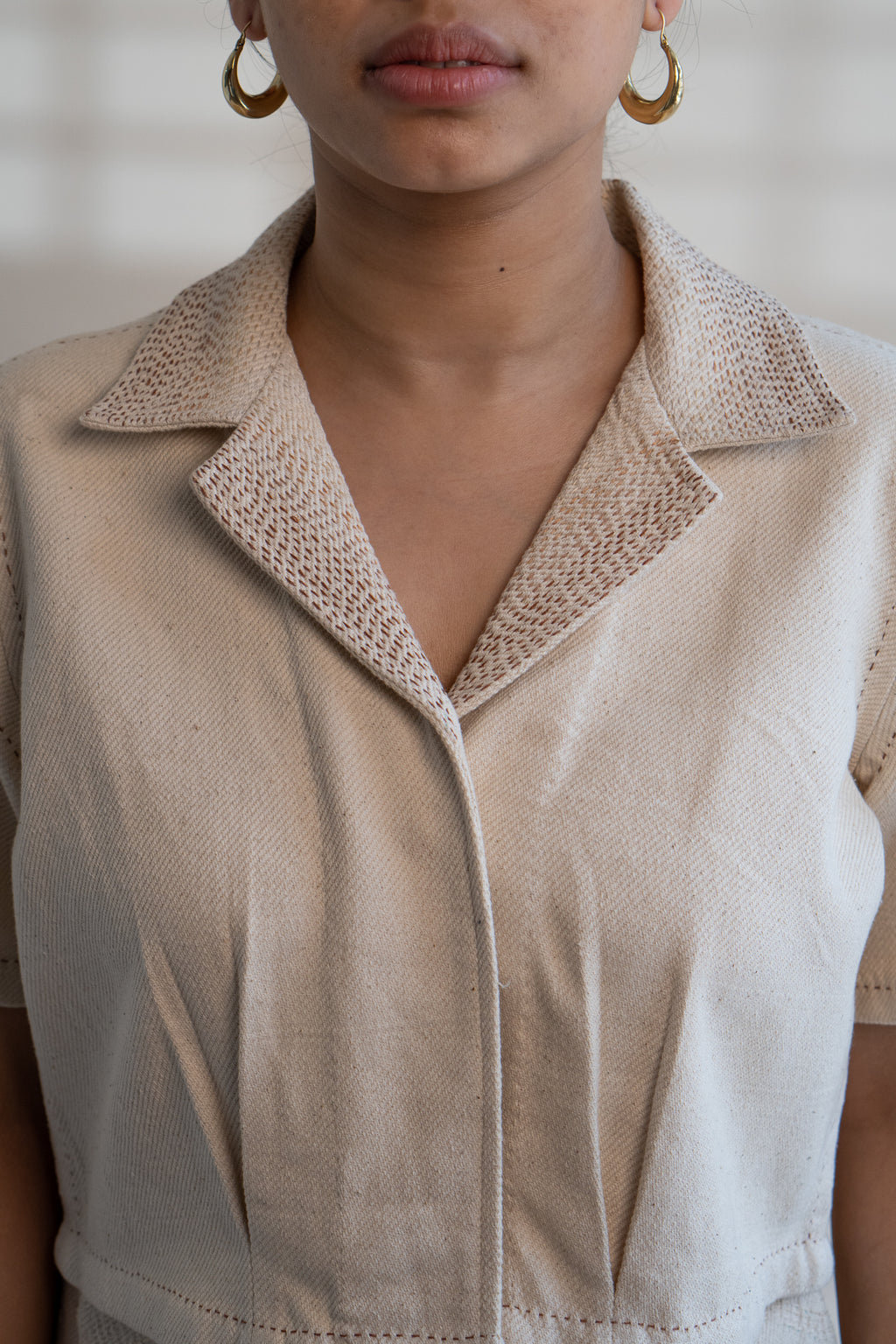 Dawning Denim Crop Jacket & Patch Pocket Pants Set at Kamakhyaa by Lafaani. This item is Beige, Casual Wear, Co-ord Sets, Denim, Embroidered, Hand Woven Cotton, Kora, Natural, Office, Office Wear Co-ords, Regular Fit, Womenswear