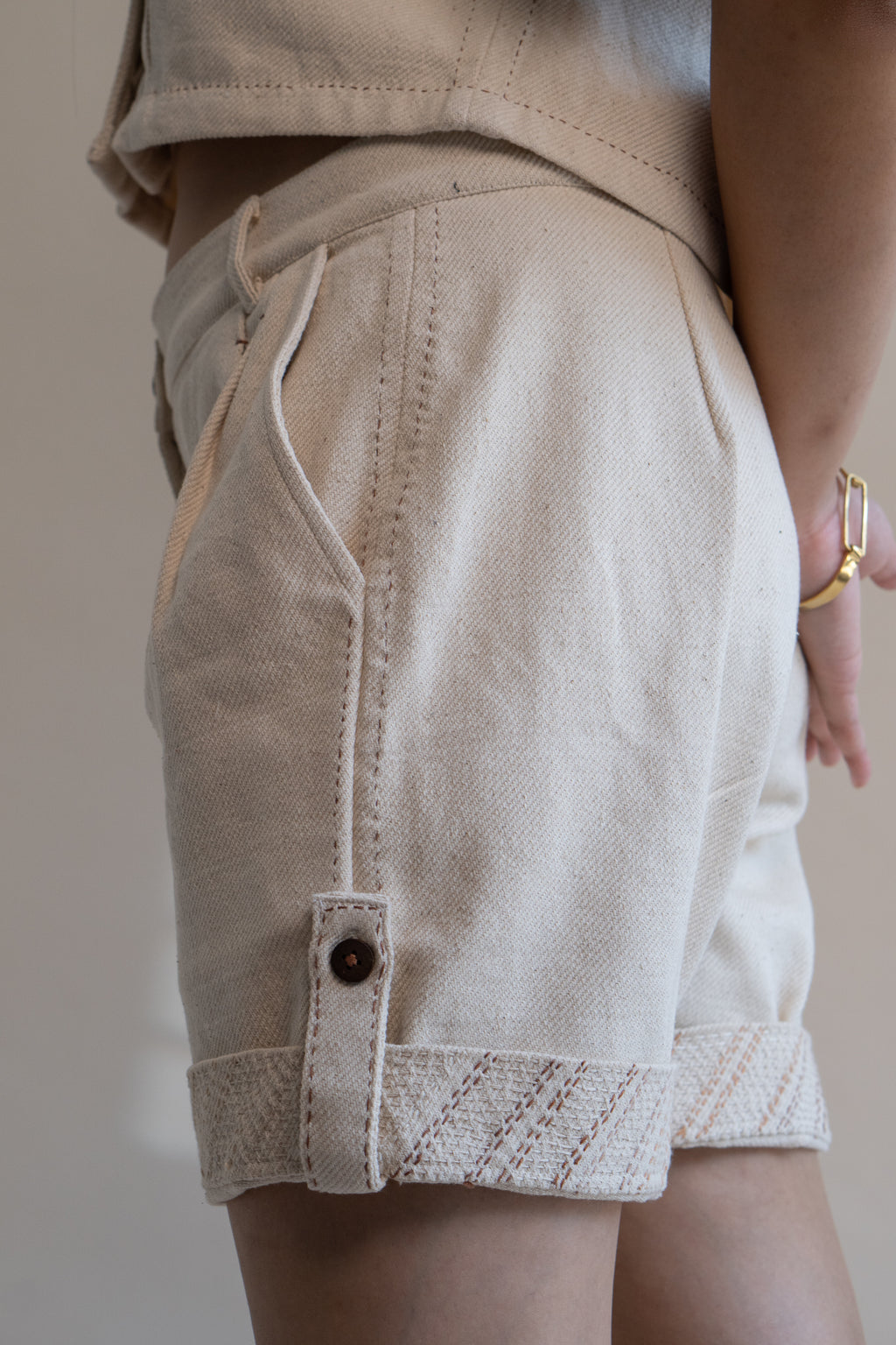 Dawning Denim Crop Jacket & Shorts Set at Kamakhyaa by Lafaani. This item is Beige, Casual Wear, Co-ord Sets, Denim, Embroidered, Hand Woven Cotton, Kora, Natural, Regular Fit, Travel, Travel Co-ords, Womenswear