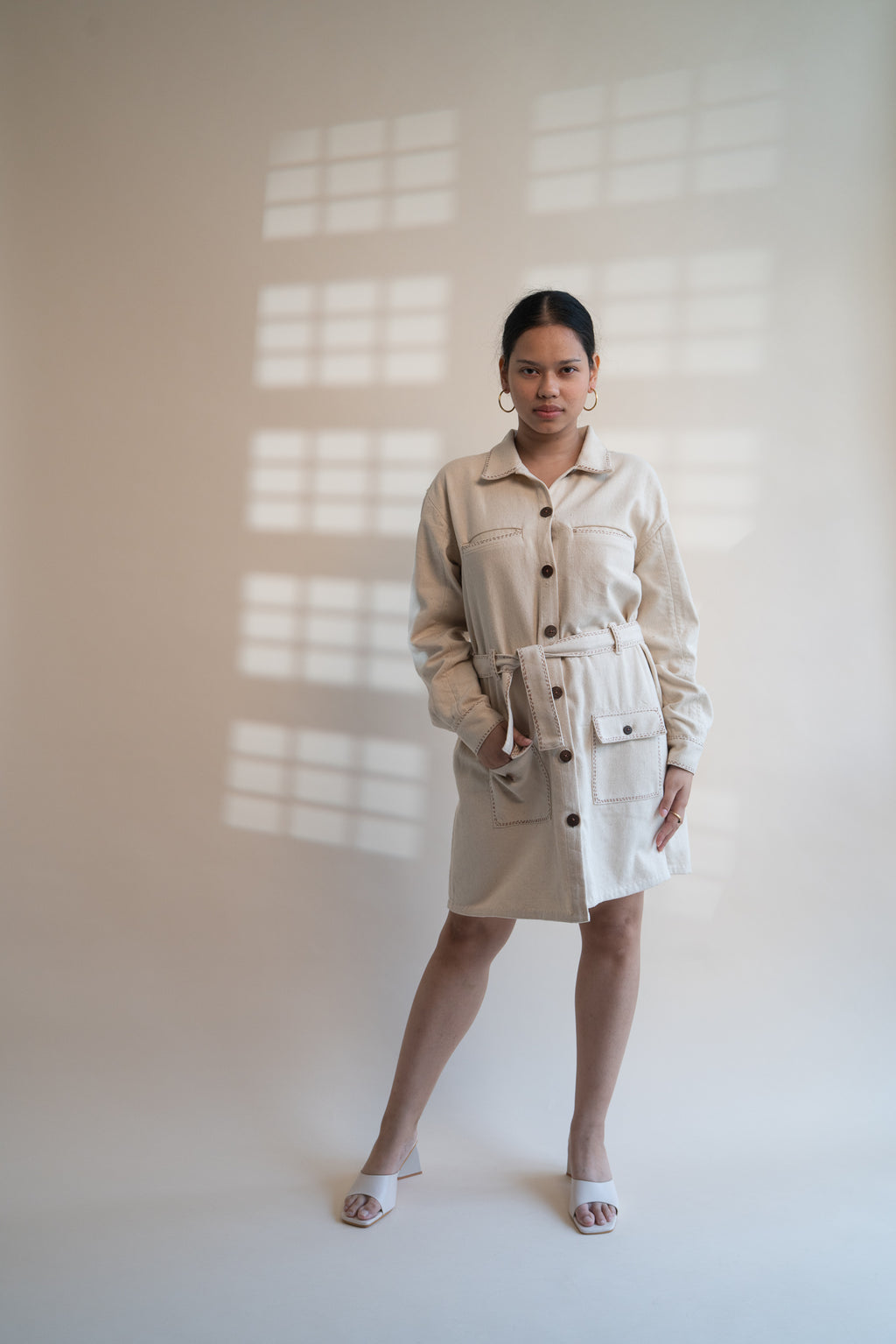 Dawning Denim Dress at Kamakhyaa by Lafaani. This item is Beige, Casual Wear, Denim, Embroidered, Hand Woven Cotton, Kora, Natural, Regular Fit, Shirt Dresses, Shirts, Womenswear